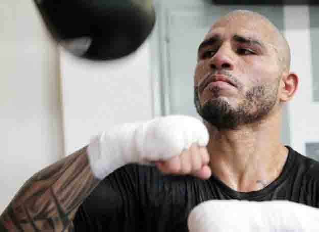 May 13, 2014, Hollywood,Ca   ---  Three-time world champion Miguel Cotto of Puerto Rico works out with Hall of Fame trainer Freddie Roach at the Wild Card Boxing Club in Hollywood for his eagerly-anticipated World Middleweight Championship collision against WBC world Middleweight champion Sergio Martinez from Argentina.       Promoted by Miguel Cotto Promotions, Top Rank®, DiBella Entertainment and Sampson Boxing, in association with Maravilla Box, Tecate and Madison Square Garden, the Cotto - Martínez World Middleweight Championship event will take place on Saturday, June 7, at the ?Mecca of Boxing,? Madison Square Garden and is produced and distributed live by HBO Pay-Per-View®, beginning at 9:00 p.m. ET / 6:00 p.m. PT.     Tickets to the Cotto vs. Martínez world middleweight championship event are available at $750, $500, $300, $200, $100 and $50, tickets can be purchased at the Madison Square Garden Box Office, all Ticketmaster outlets, Ticketmaster charge by phone (866-858-0008), and online at www.ticketmaster.com and www.thegarden.com. --- Photo Credit : Chris Farina - Top Rank (no other credit allowed) copyright 2014