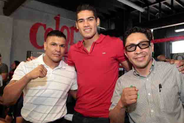 May 31, 2015, Lynwood,Ca.   --- Undefeated Mexican knockout artist and No. 2-world-rated super middleweight contender  Gilberto "Zurdo" Ramirez(with Daniel Ponce de Leon and Israel Vazquez)  meets and greets fans during an event for the  WBC : World Boxing Cares in East Los Angeles. Ramirez will headline an all-action card on Friday, June 26, at State Farm Arena in Hidalgo, TX.  Ramirez will be taking on DERECK "The Black Lion" EDWARDS in a 10- round super middleweight bout which will be televised live on The MetroPCS Friday Night Knockout on truTV® at 10:00 p.m. ET.  The live boxing series is presented by truTV and Top Rank®, and produced in association with HBO Sports®.  Find truTV on YOUR TV:  http://trutvishere.com/ Promoted by Top Rank and Zapari Boxing Promotions, in association with Nord Boxing Promotions and Zanfer Promotions,  tickets to the Ramirez-Edwards boxing event are priced at $35, $25, $15, plus VIP tables of ten (10) at $800, $650 and $550, tickets can be purchased at the State Farm Arena box office, online at www.ticketmaster.com or by phone at (956) 843-6688. ---   Photo Credit : Chris Farina - Top Rank (no other credit allowed)  copyright 2015