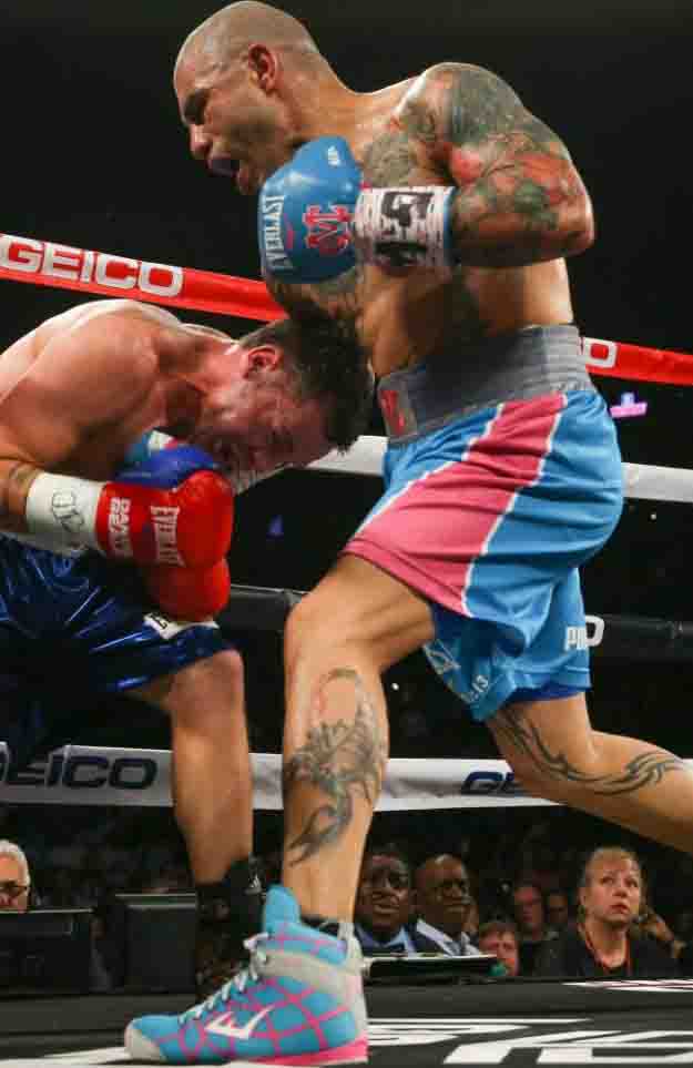 NEW YORK, NY - JUNE 6: Miguel Cotto (R) punches Daniel Geale during their WBC middleweight world championship fight at the Barclays Center on June 6, 2015 in the Brooklyn borough of New York City. (Photo by Ed Mulholland/Getty Images)